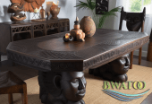 African sculpted wooden dining table