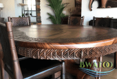 African sculpted wooden dining table